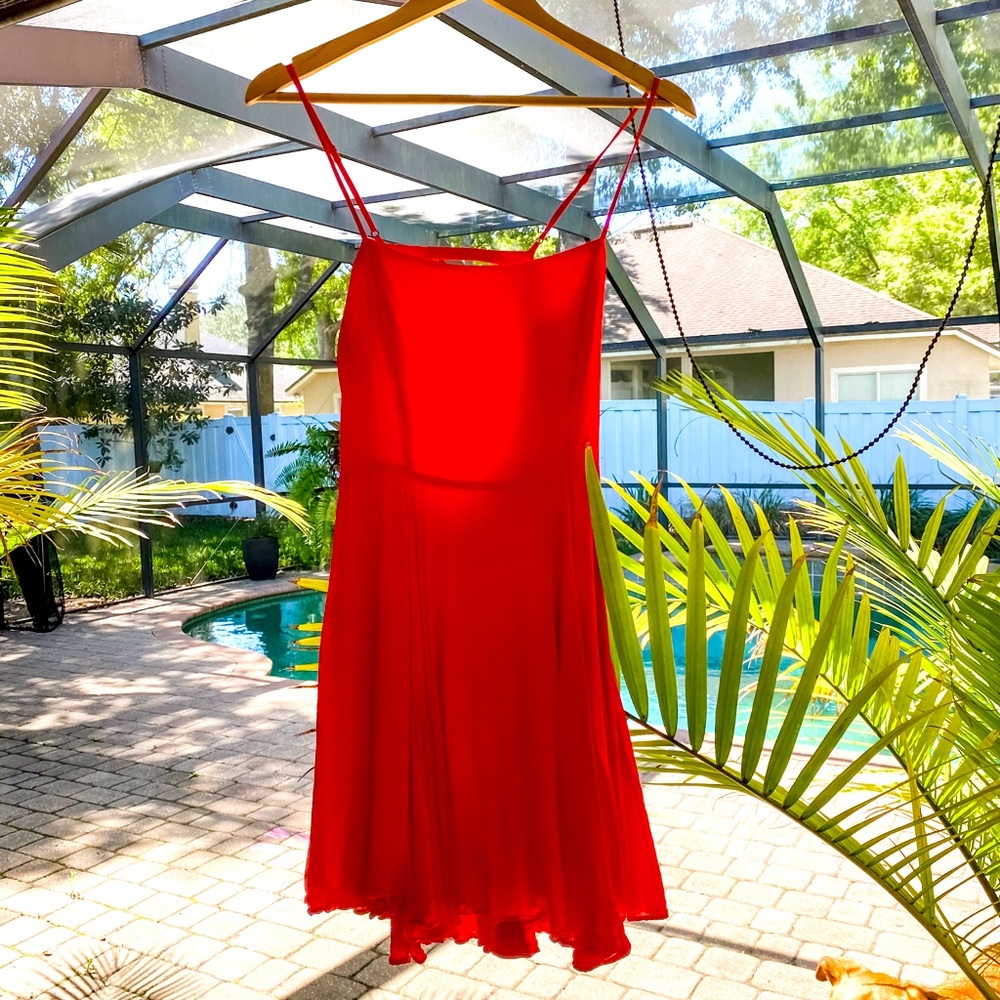 Red sundress with adjustable straps and cutout back!